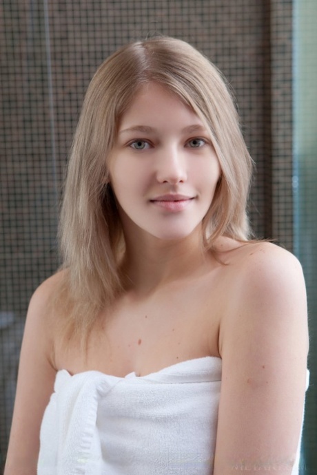 Blonde babe Mila I with bare feet showing tight ass & bald twat in the shower 37612750