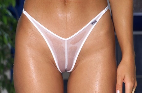 Amateur model removes wet bikini before dildoing her shaved pussy 27144428