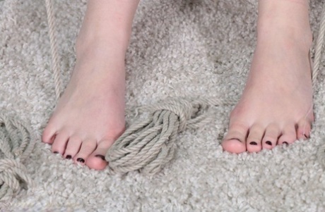 Solo girl with short blonde hair ends up cross legged while tied up with rope 35267224