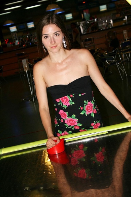 Brunette amateur Leila exposes her tiny tits before a game of air hockey 96762336