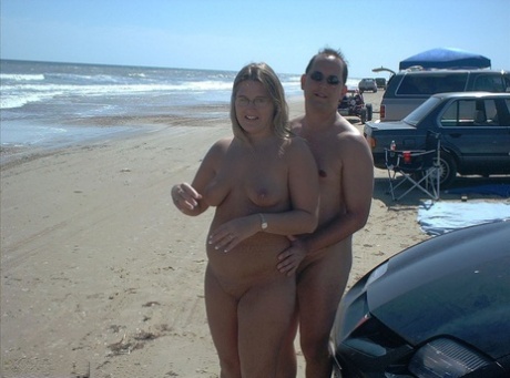 Glasses wearing amateur BBW gets gangbanged on a nude beach 50232672