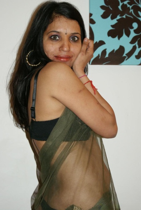 Indian MILF Kavya Sharma does away with her clothing to go nude on a couch 12796173