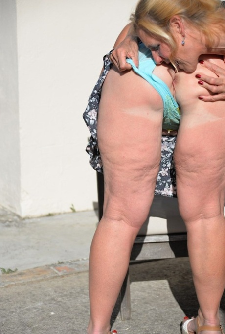 Thick lesbian Melody has her asshole cleaned by her lover's tongue on a patio 79557934