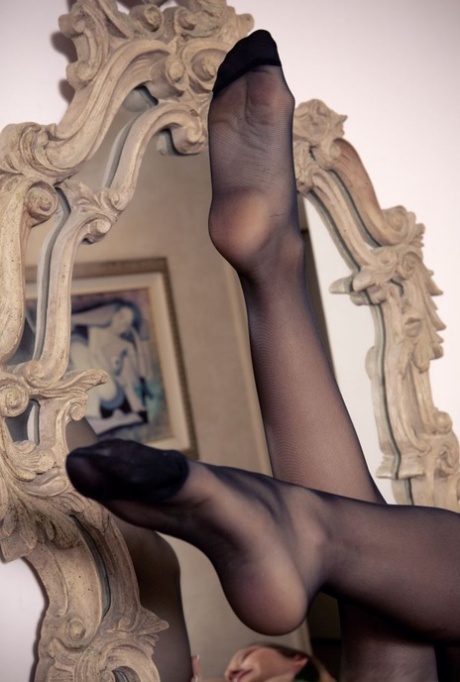 Solo girl Dani Daniels rocks her thong clad booty in a dresser mirror 23212359