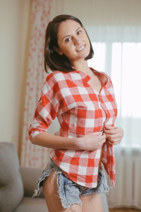 Nice teen Sade Mare unbuttons her shirt and doffs cutoffs to pose in the buff 65433610